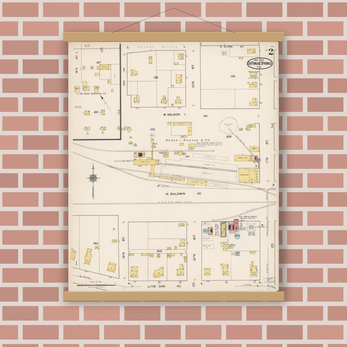 Old map wall art mockup — magnetic wood frame on brick wall — Sanborn Fire Insurance Map from De Funiak Springs, Walton County, Florida (1922), Sheet #0002