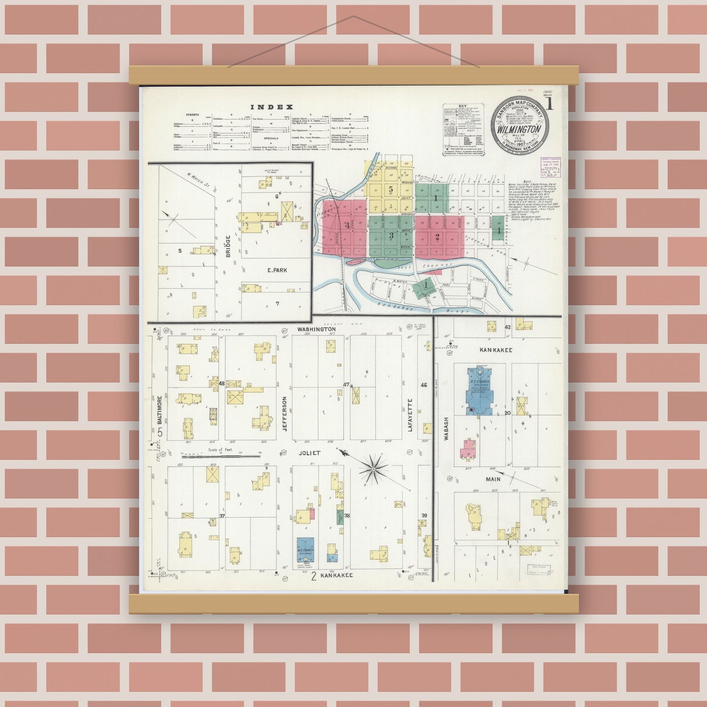 Old map wall art mockup — magnetic wood frame on brick wall — Sanborn Fire Insurance Map from Wilmington, Will County, Illinois (1907), Sheet #0001