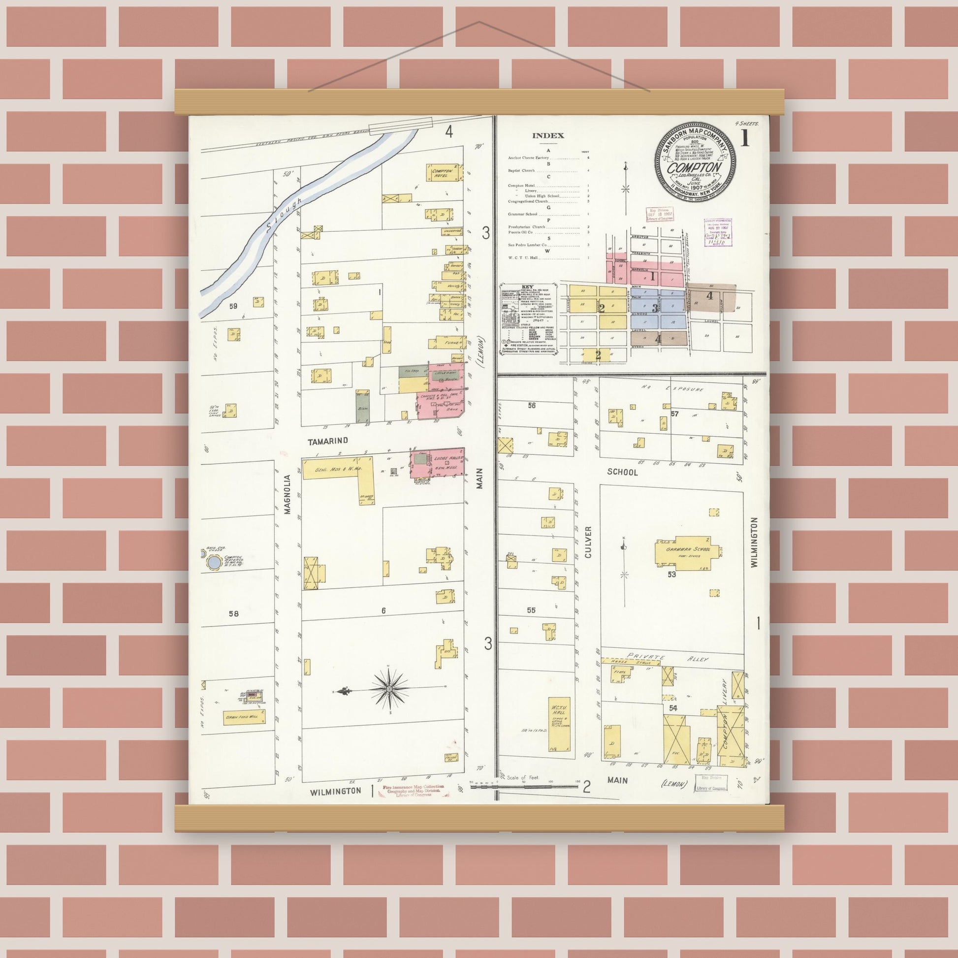 Old map wall art mockup — magnetic wood frame on brick wall — Sanborn Fire Insurance Map from Compton, Los Angeles County, California (1907), Sheet #0001