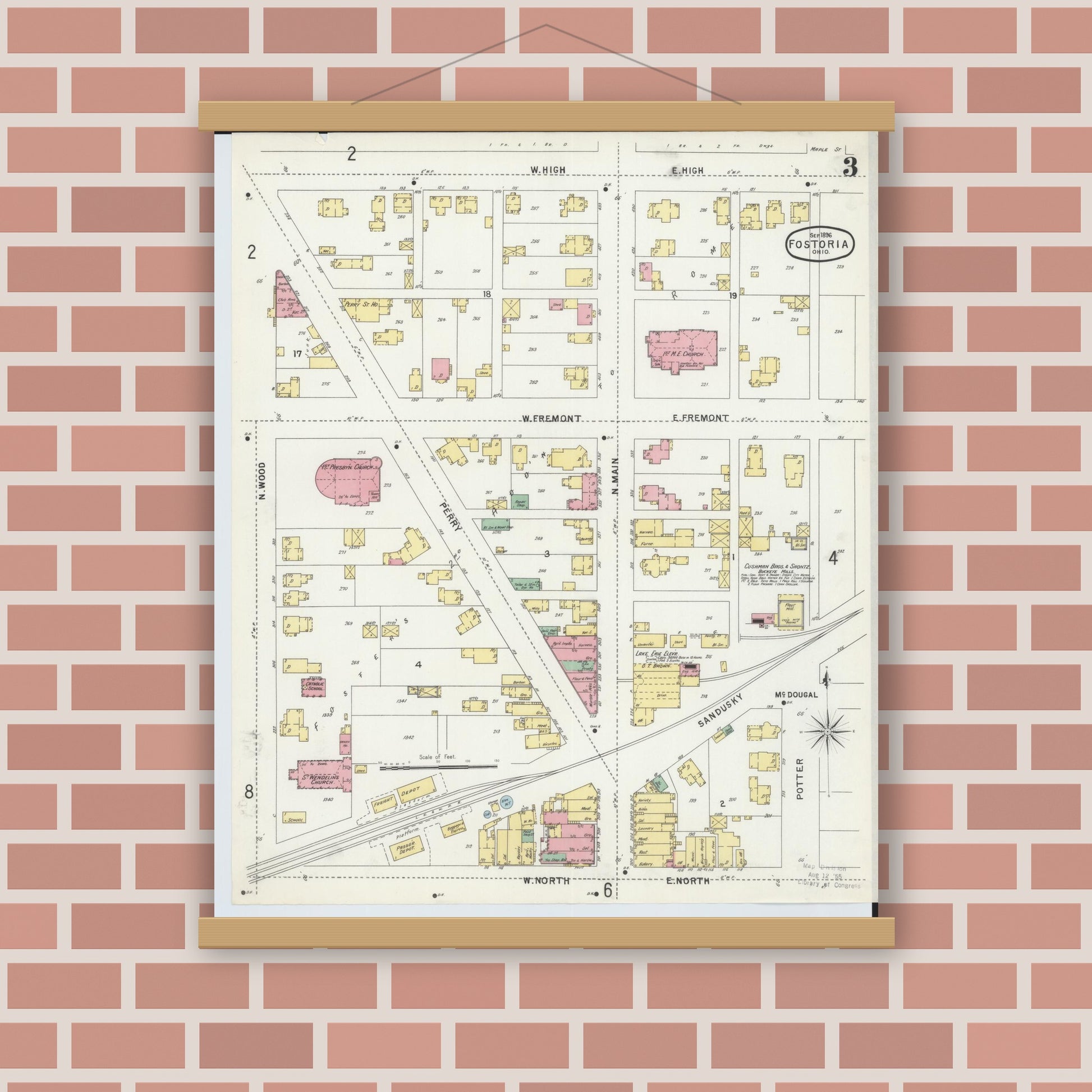 Old map wall art mockup — magnetic wood frame on brick wall — Sanborn Fire Insurance Map from Fostoria, Seneca, Hancock, And Wood Counties, Ohio (1896), Sheet #0003