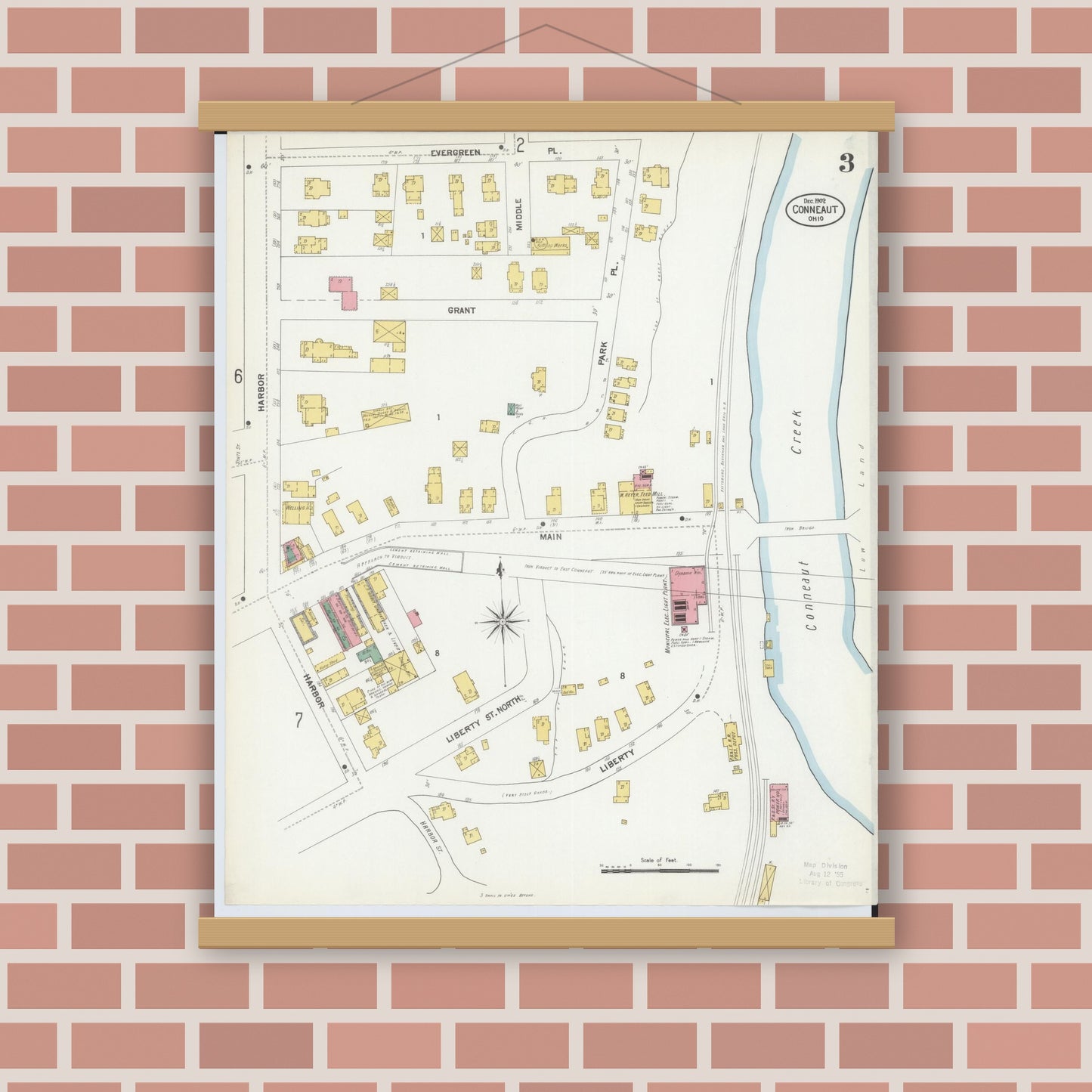 Old map wall art mockup — magnetic wood frame on brick wall — Sanborn Fire Insurance Map from Conneaut, Ashtabula County, Ohio (1902), Sheet #0003