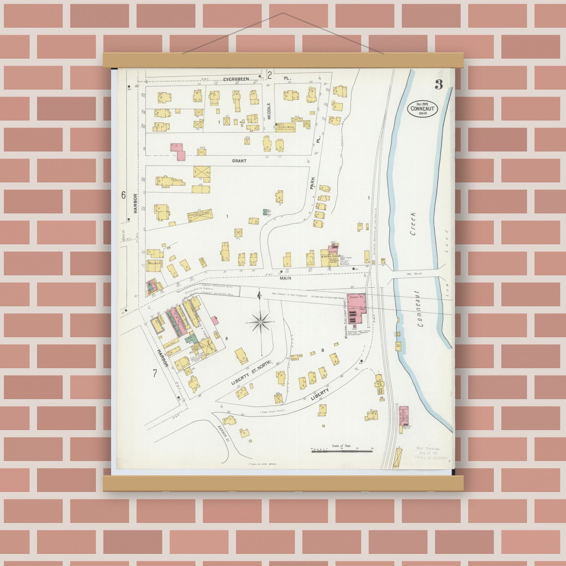 Old map wall art mockup — magnetic wood frame on brick wall — Sanborn Fire Insurance Map from Conneaut, Ashtabula County, Ohio (1902), Sheet #0003