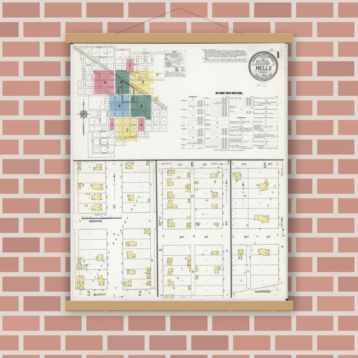 Old map wall art mockup — magnetic wood frame on brick wall — Sanborn Fire Insurance Map from Wells, Faribault County, Minnesota (1909), Sheet #0001