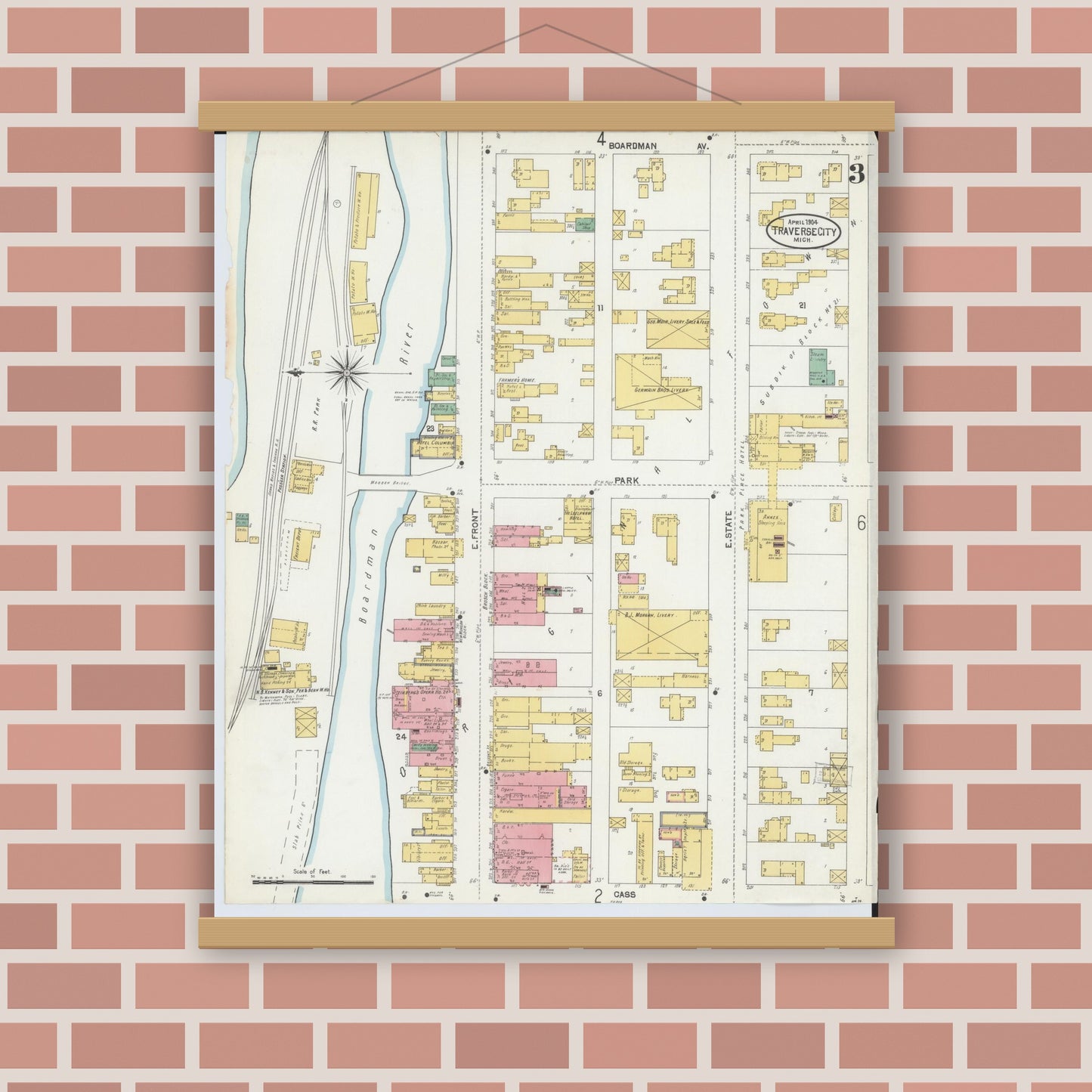 Old map wall art mockup — magnetic wood frame on brick wall — Sanborn Fire Insurance Map from Traverse City, Grand Traverse County, Michigan (1904), Sheet #0003