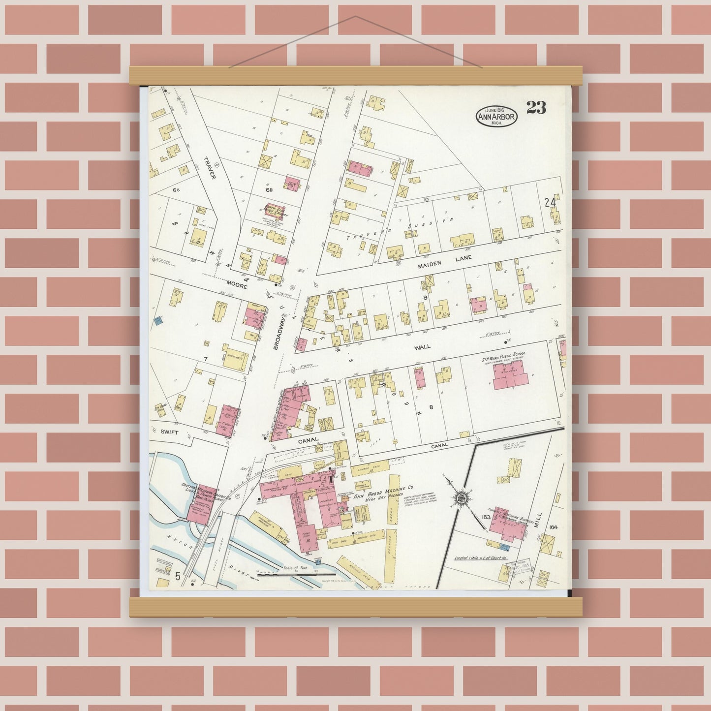 Old map wall art mockup — magnetic wood frame on brick wall — Sanborn Fire Insurance Map from Ann Arbor, Washtenaw County, Michigan (1916), Sheet #0023