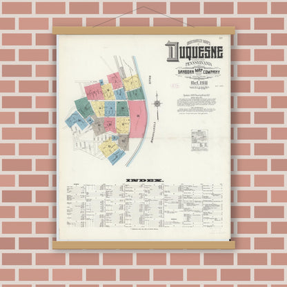 Old map wall art mockup — magnetic wood frame on brick wall — Sanborn Fire Insurance Map from Duquesne, Allegheny County, Pennsylvania (1911), Sheet #0001