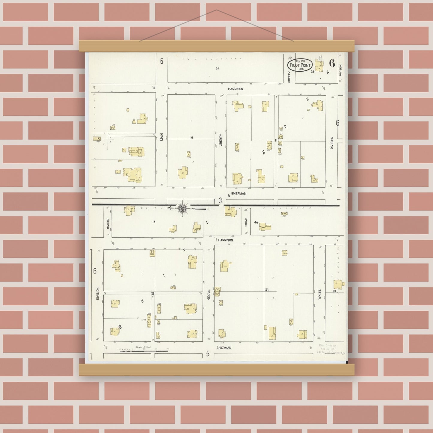 Old map wall art mockup — magnetic wood frame on brick wall — Sanborn Fire Insurance Map from Pilot Point, Denton County, Texas (1912), Sheet #0006