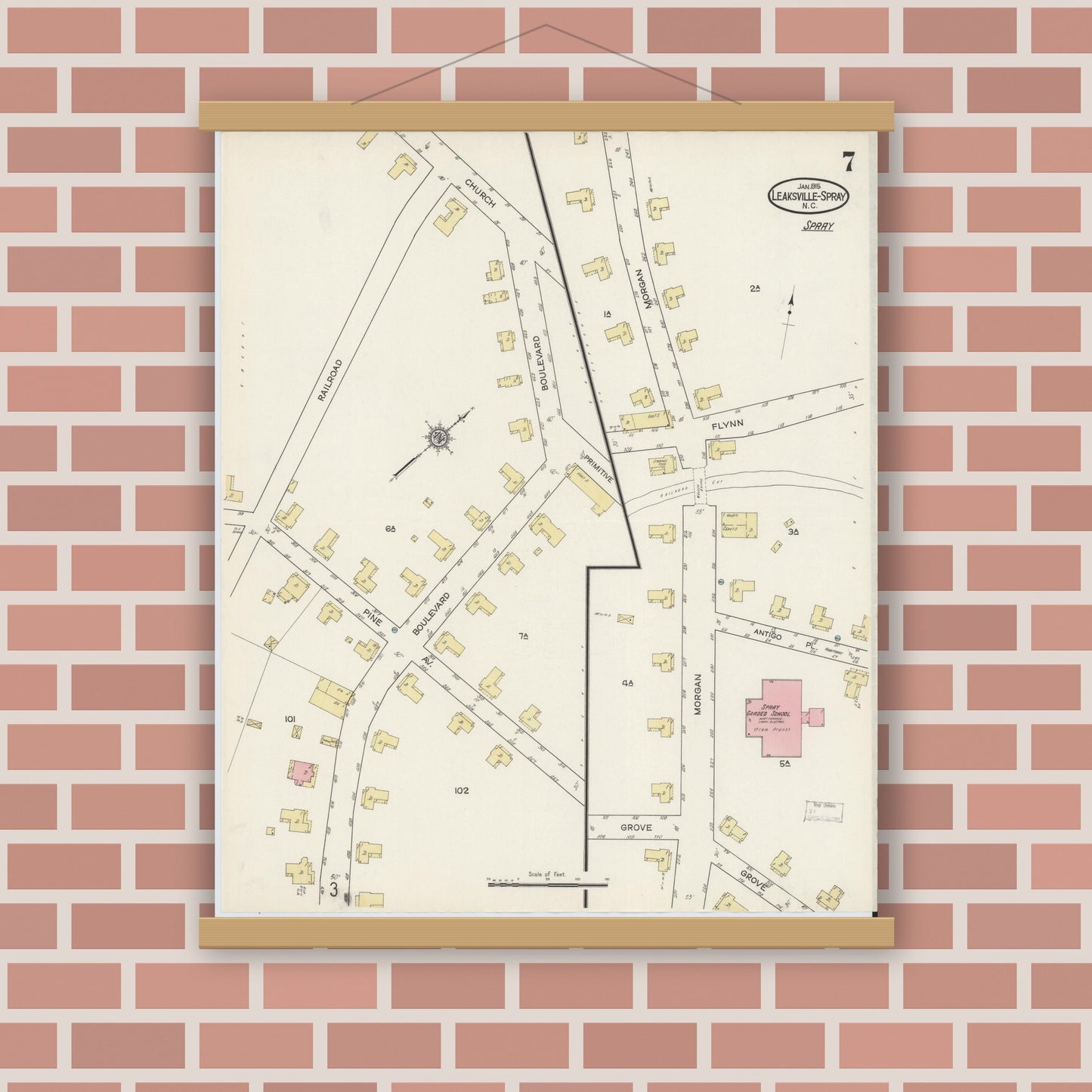 Old map wall art mockup — magnetic wood frame on brick wall — Sanborn Fire Insurance Map from Leaksville-spray, Rockingham County, North Carolina (1915), Sheet #0007