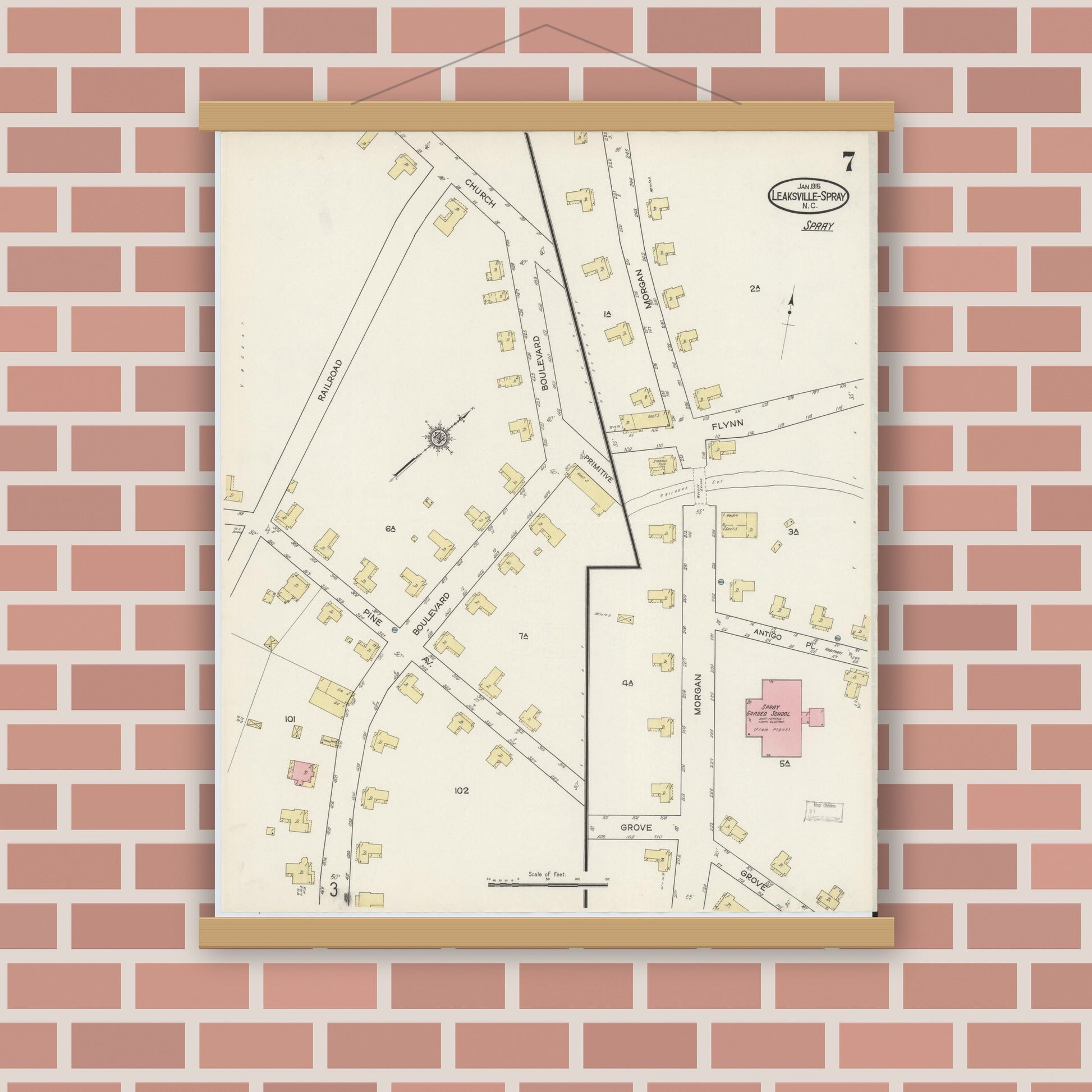 Old map wall art mockup — magnetic wood frame on brick wall — Sanborn Fire Insurance Map from Leaksville-spray, Rockingham County, North Carolina (1915), Sheet #0007