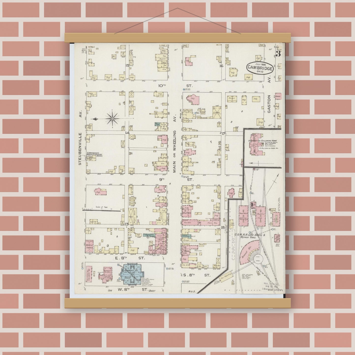Old map wall art mockup — magnetic wood frame on brick wall — Sanborn Fire Insurance Map from Cambridge, Guernsey County, Ohio (1886), Sheet #0003