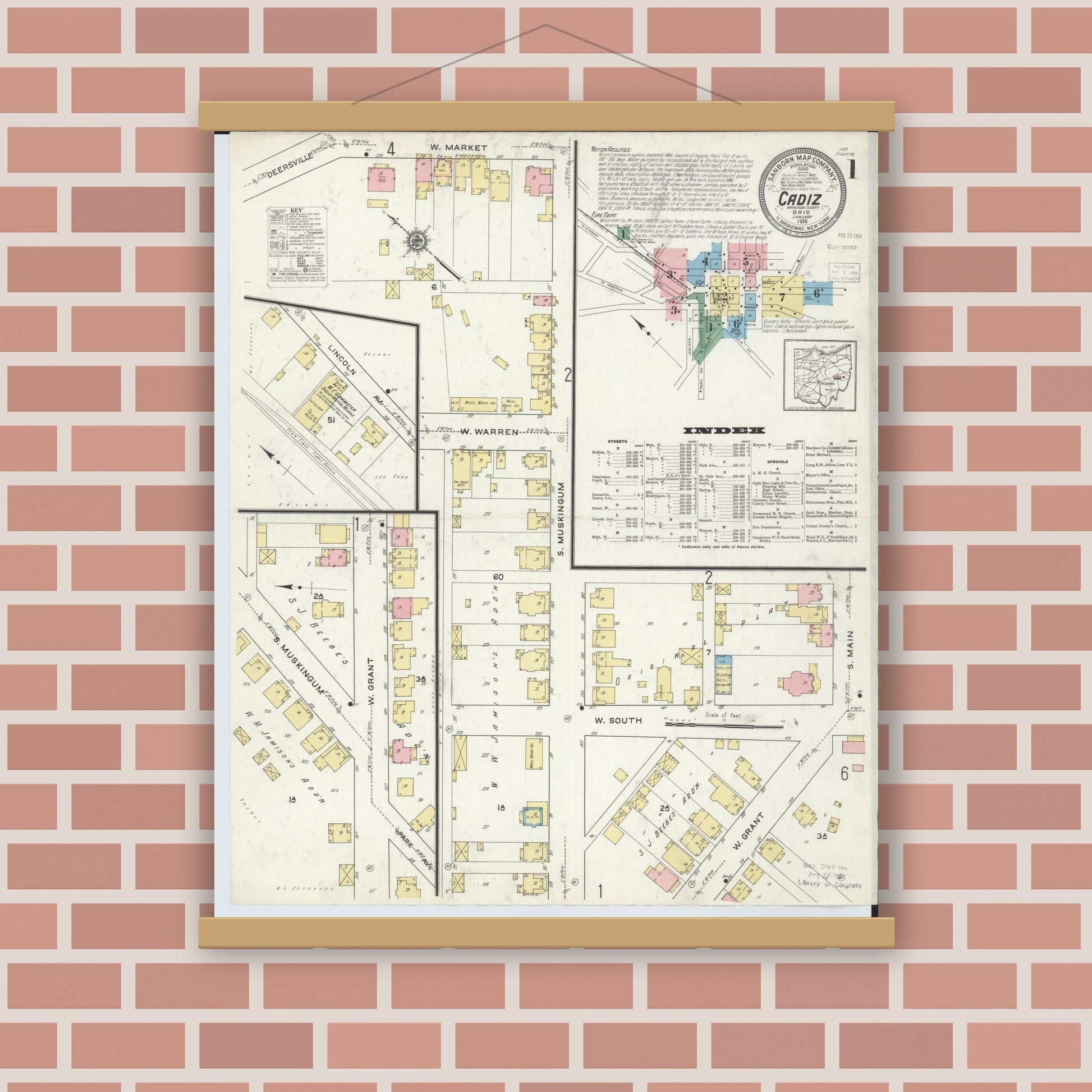 Old map wall art mockup — magnetic wood frame on brick wall — Sanborn Fire Insurance Map from Cadiz, Harrison County, Ohio (1916), Sheet #0001