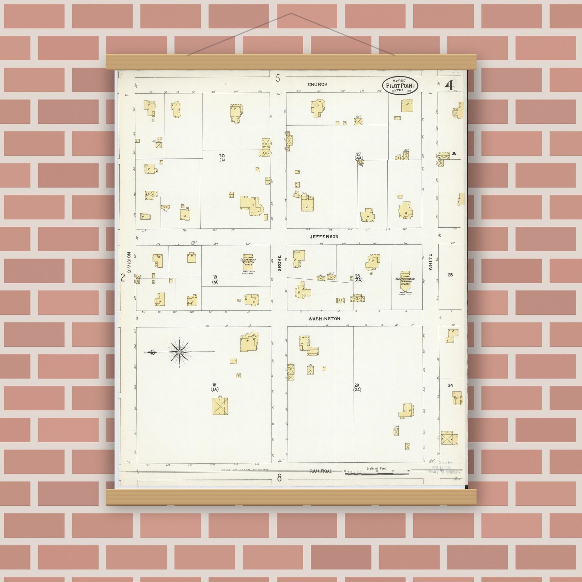 Old map wall art mockup — magnetic wood frame on brick wall — Sanborn Fire Insurance Map from Pilot Point, Denton County, Texas (1907), Sheet #0004