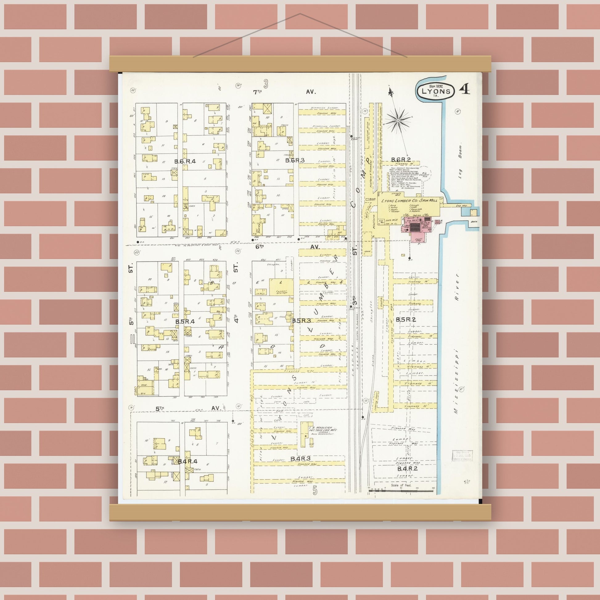 Old map wall art mockup — magnetic wood frame on brick wall — Sanborn Fire Insurance Map from Lyons, Clinton County, Iowa (1892), Sheet #0004