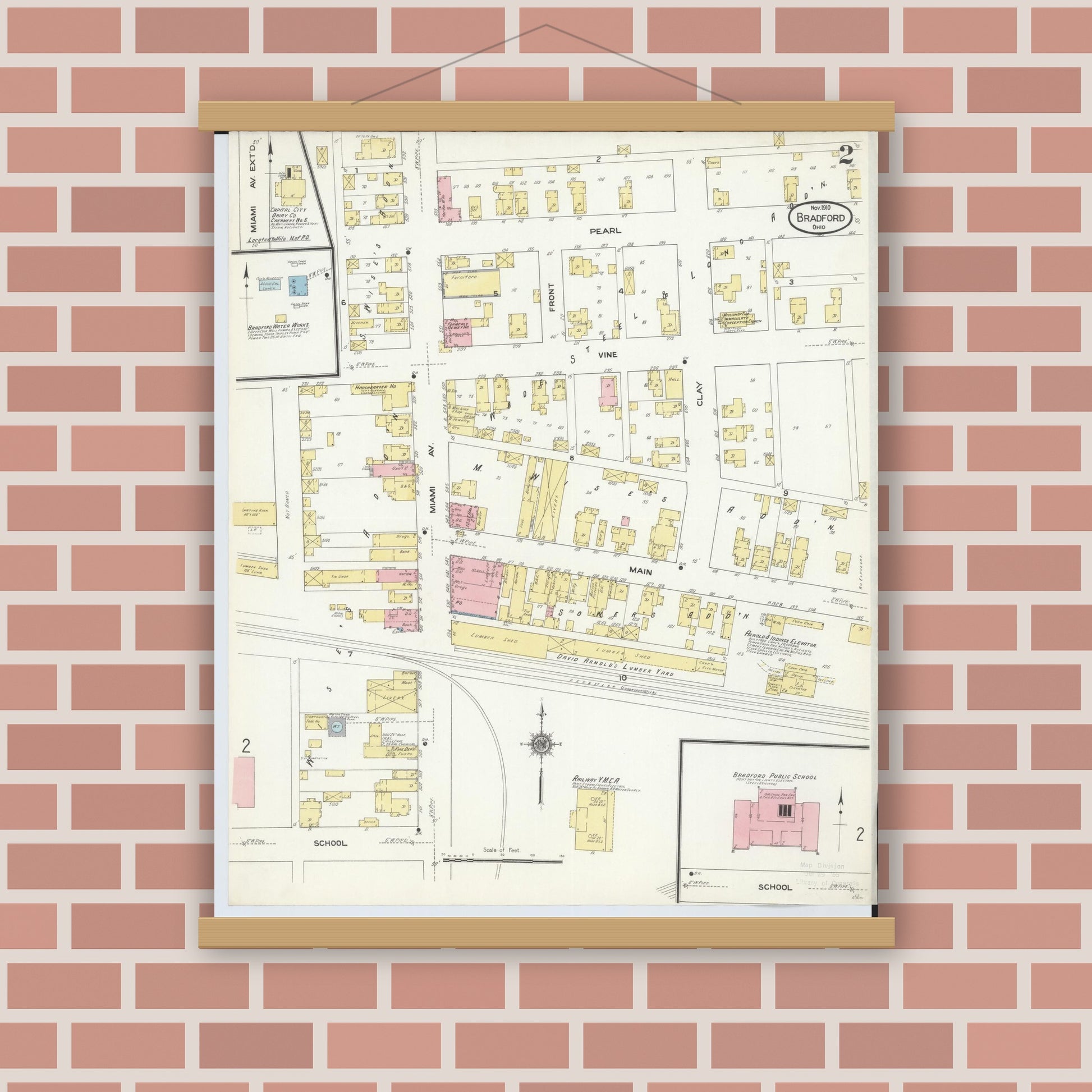 Old map wall art mockup — magnetic wood frame on brick wall — Sanborn Fire Insurance Map from Bradford, Darke and Miami Counties, Ohio (1910), Sheet #0002