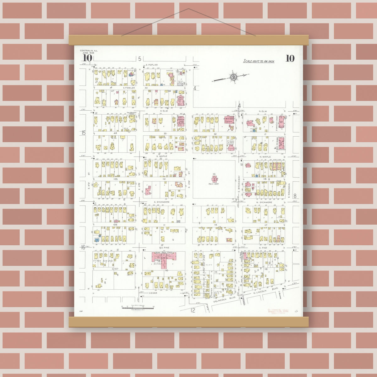 Old map wall art mockup — magnetic wood frame on brick wall — Sanborn Fire Insurance Map from Centralia, Marion, Clinton, Jefferson, and Washington Counties, Illinois (1938), Sheet #0010
