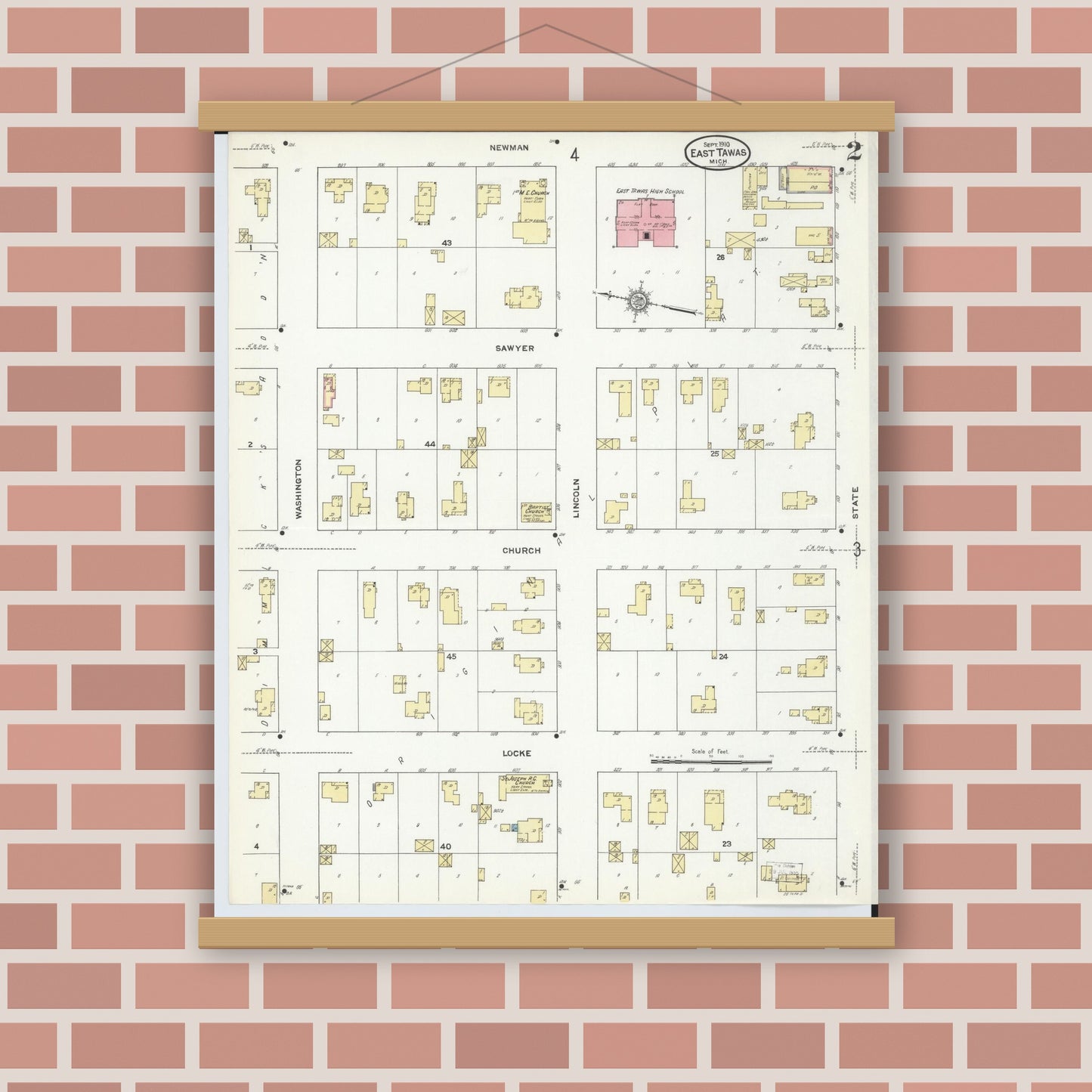 Old map wall art mockup — magnetic wood frame on brick wall — Sanborn Fire Insurance Map from East Tawas, Iosco County, Michigan (1910), Sheet #0002