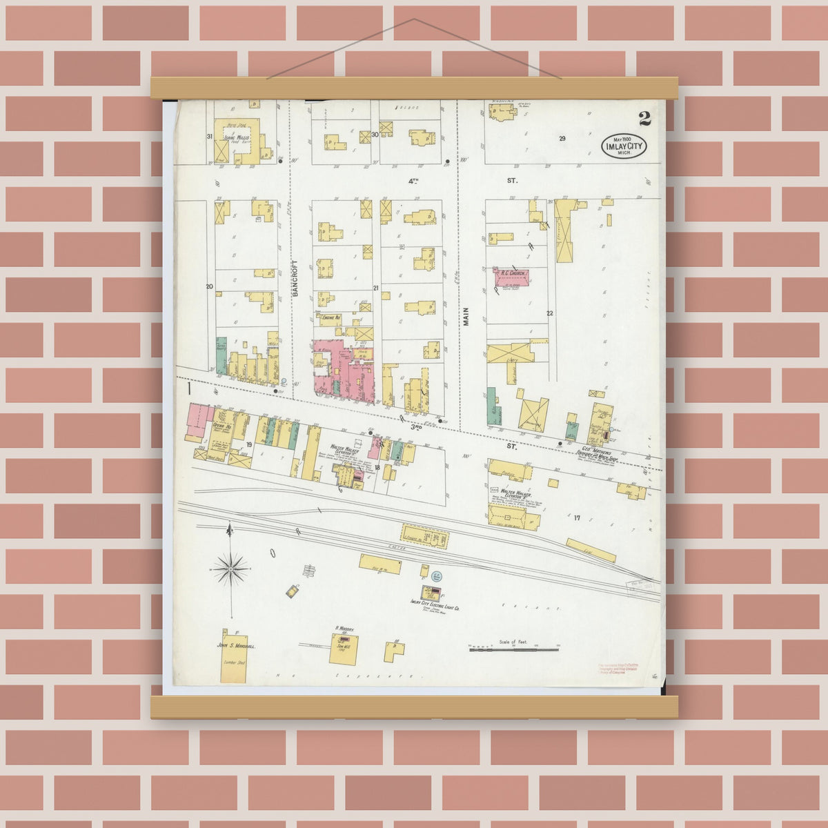 Old map wall art mockup — magnetic wood frame on brick wall — Sanborn Fire Insurance Map from Imlay City, Lapeer County, Michigan (1900), Sheet #0002
