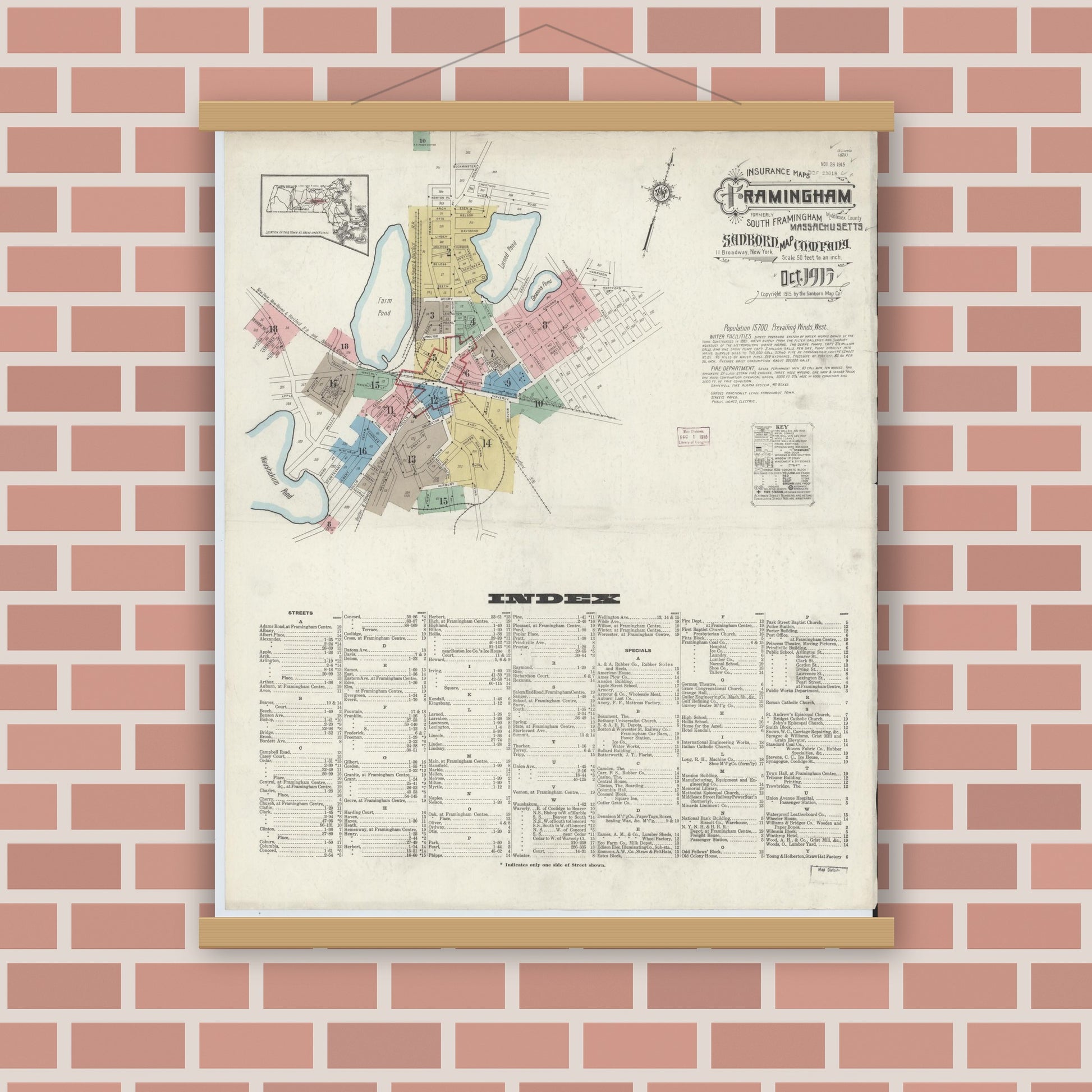 Old map wall art mockup — magnetic wood frame on brick wall — Sanborn Fire Insurance Map from Framingham, Middlesex County, Massachusetts (1915), Sheet #0001