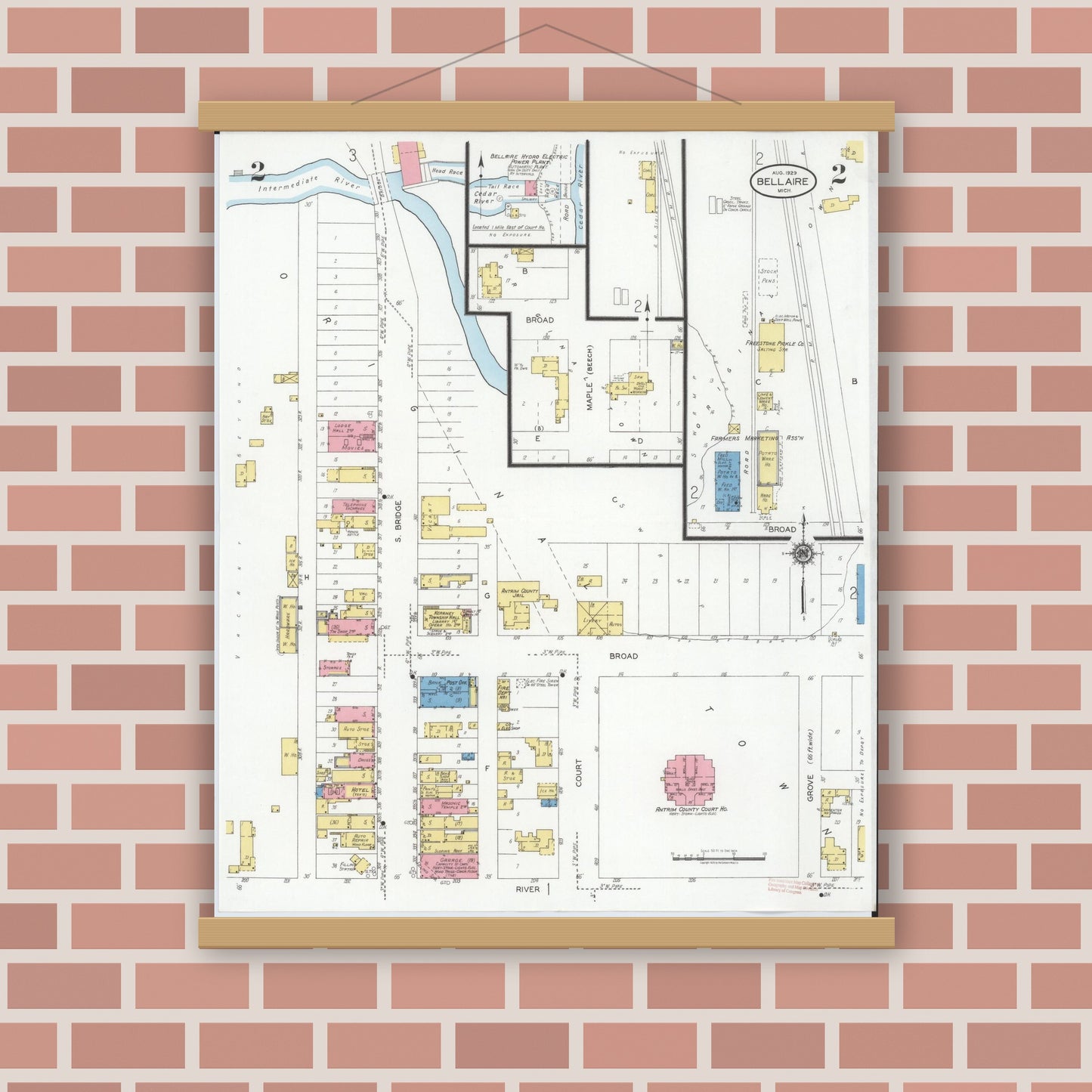 Old map wall art mockup — magnetic wood frame on brick wall — Sanborn Fire Insurance Map from Bellaire, Antrim County, Michigan (1929), Sheet #0002