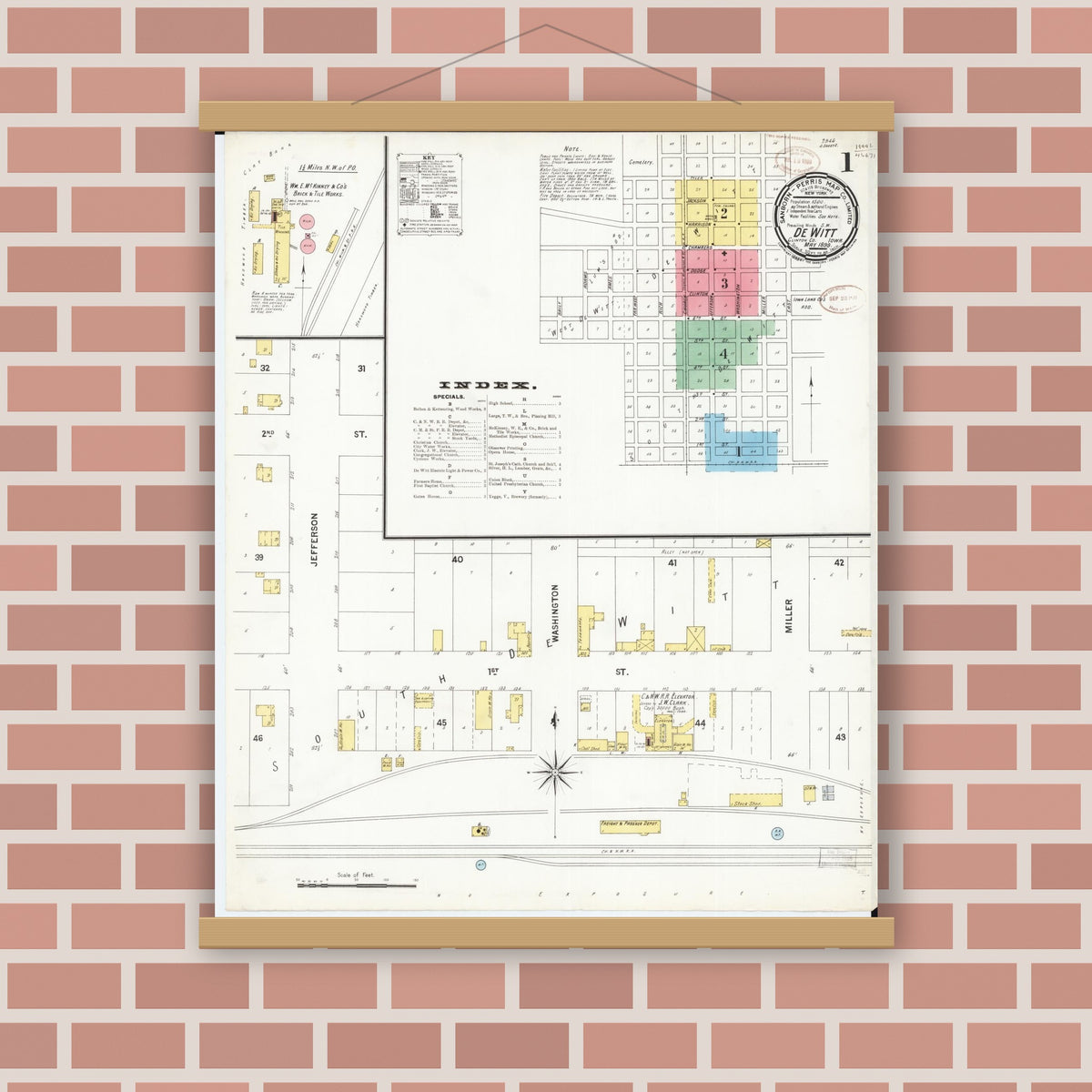 Old map wall art mockup — magnetic wood frame on brick wall — Sanborn Fire Insurance Map from De Witt, Clinton County, Iowa (1899), Sheet #0001