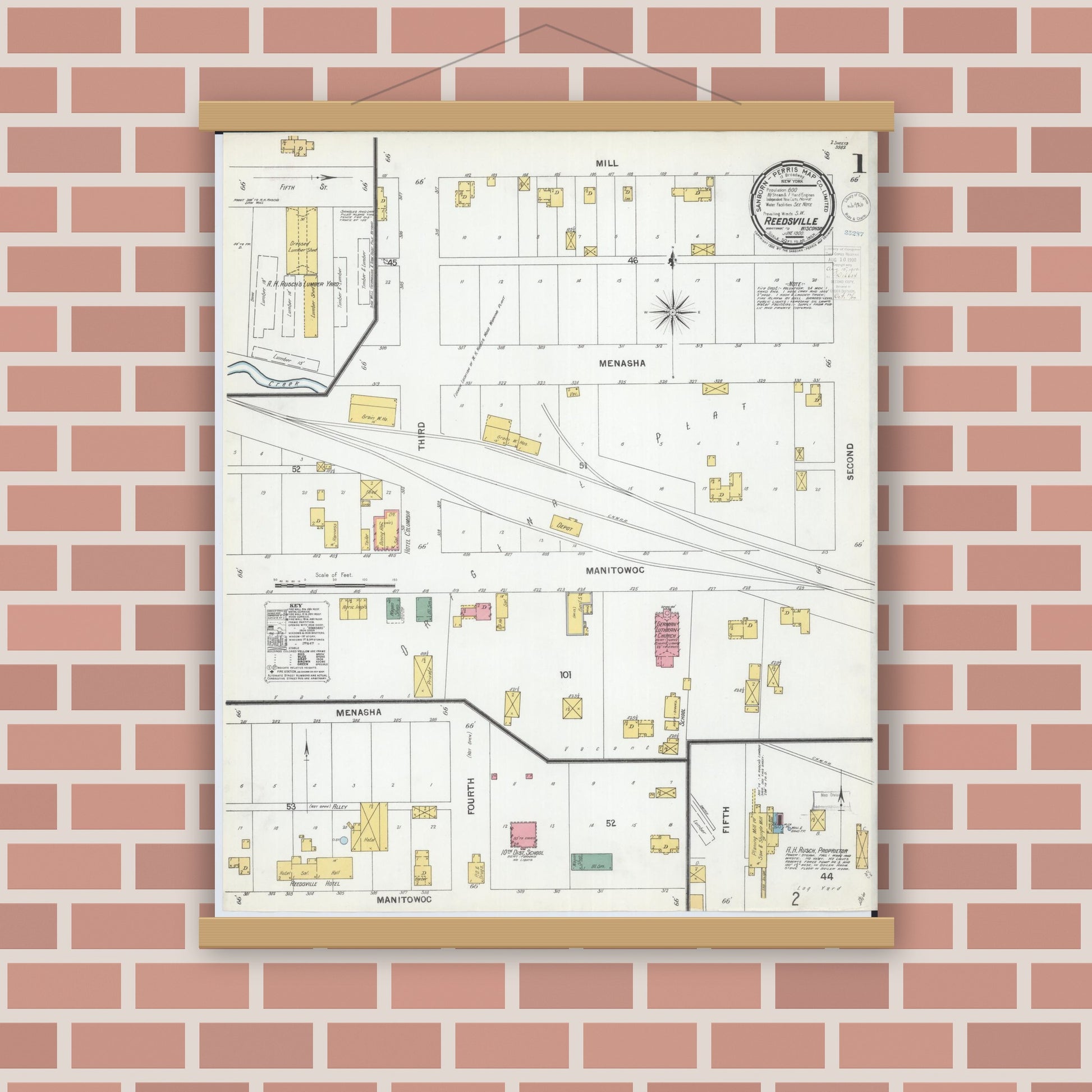 Old map wall art mockup — magnetic wood frame on brick wall — Sanborn Fire Insurance Map from Reedsville, Manitowoc County, Wisconsin (1900) - Complete Map Set