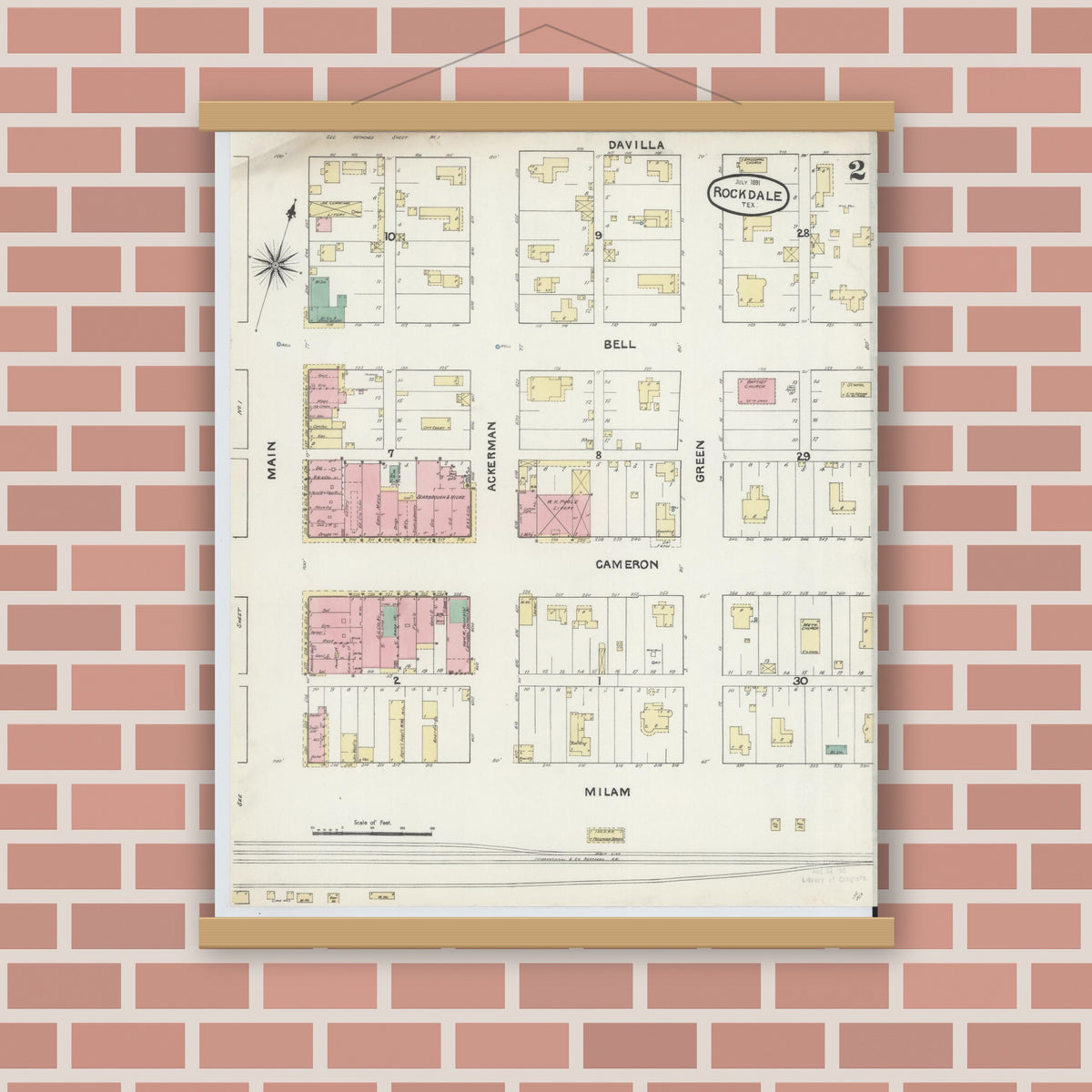 Old map wall art mockup — magnetic wood frame on brick wall — Sanborn Fire Insurance Map from Rockdale, Milam County, Texas (1891), Sheet #0002