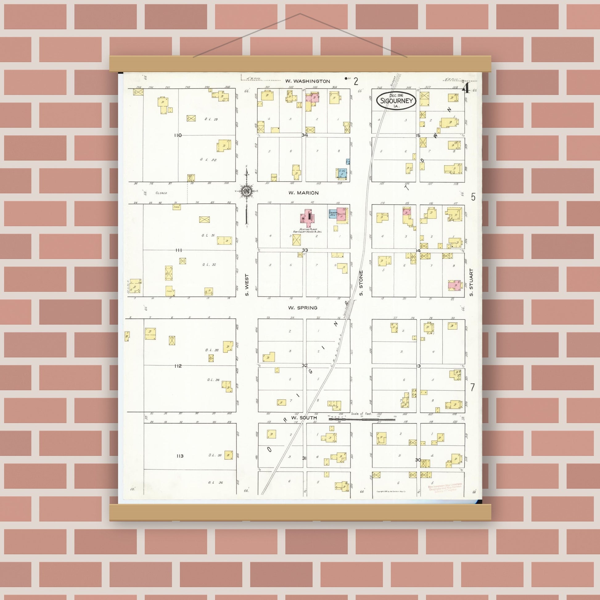 Old map wall art mockup — magnetic wood frame on brick wall — Sanborn Fire Insurance Map from Sigourney, Kiokuk County, Iowa (1916), Sheet #0004