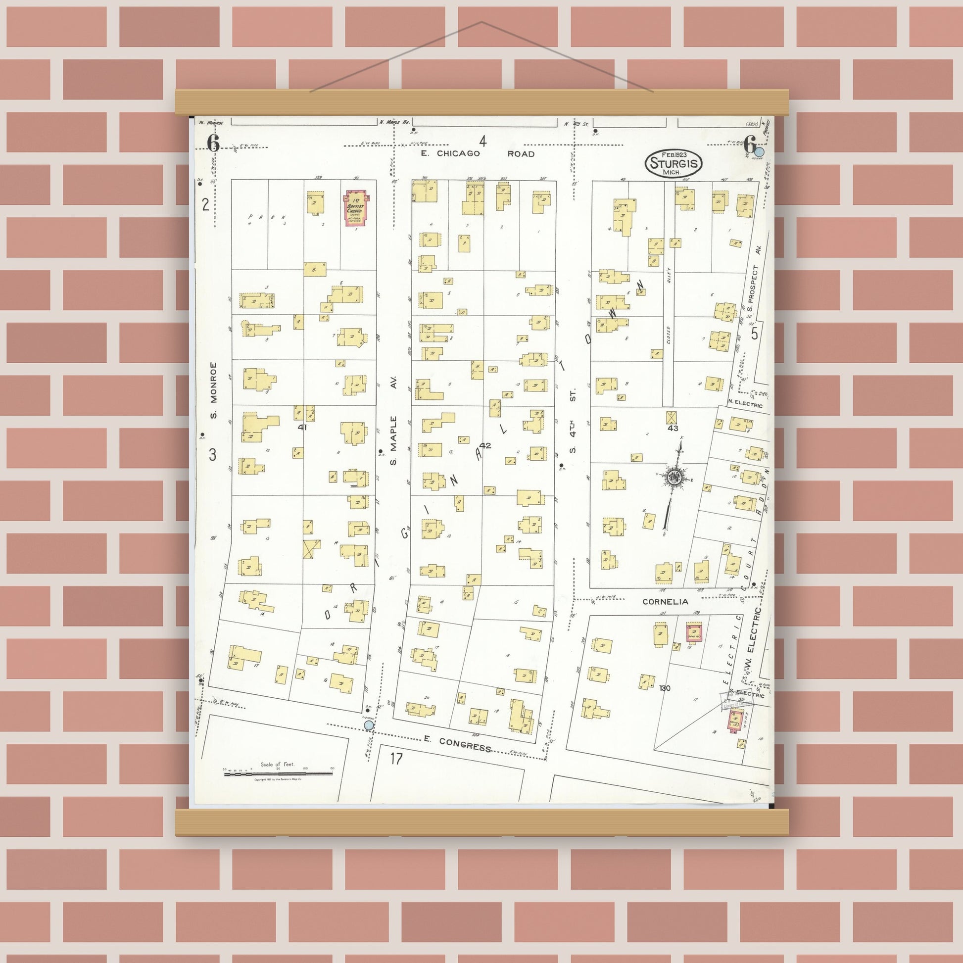 Old map wall art mockup — magnetic wood frame on brick wall — Sanborn Fire Insurance Map from Sturgis, Saint Joseph County, Michigan (1923), Sheet #0006