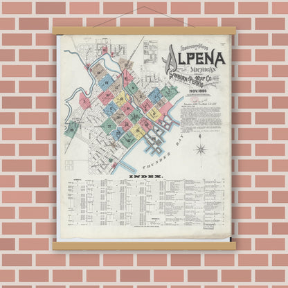 Old map wall art mockup — magnetic wood frame on brick wall — Sanborn Fire Insurance Map from Alpena, Alpena County, Michigan (1895), Sheet #0001