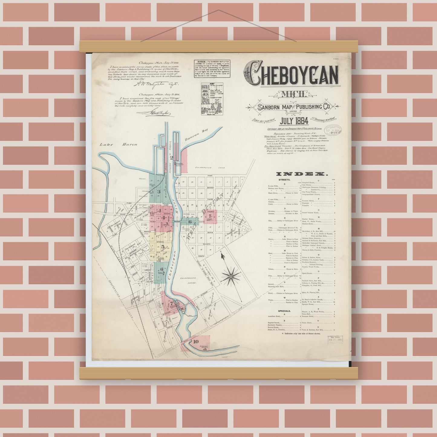 Old map wall art mockup — magnetic wood frame on brick wall — Sanborn Fire Insurance Map from Cheboygan, Cheboygan County, Michigan (1884), Sheet #0001