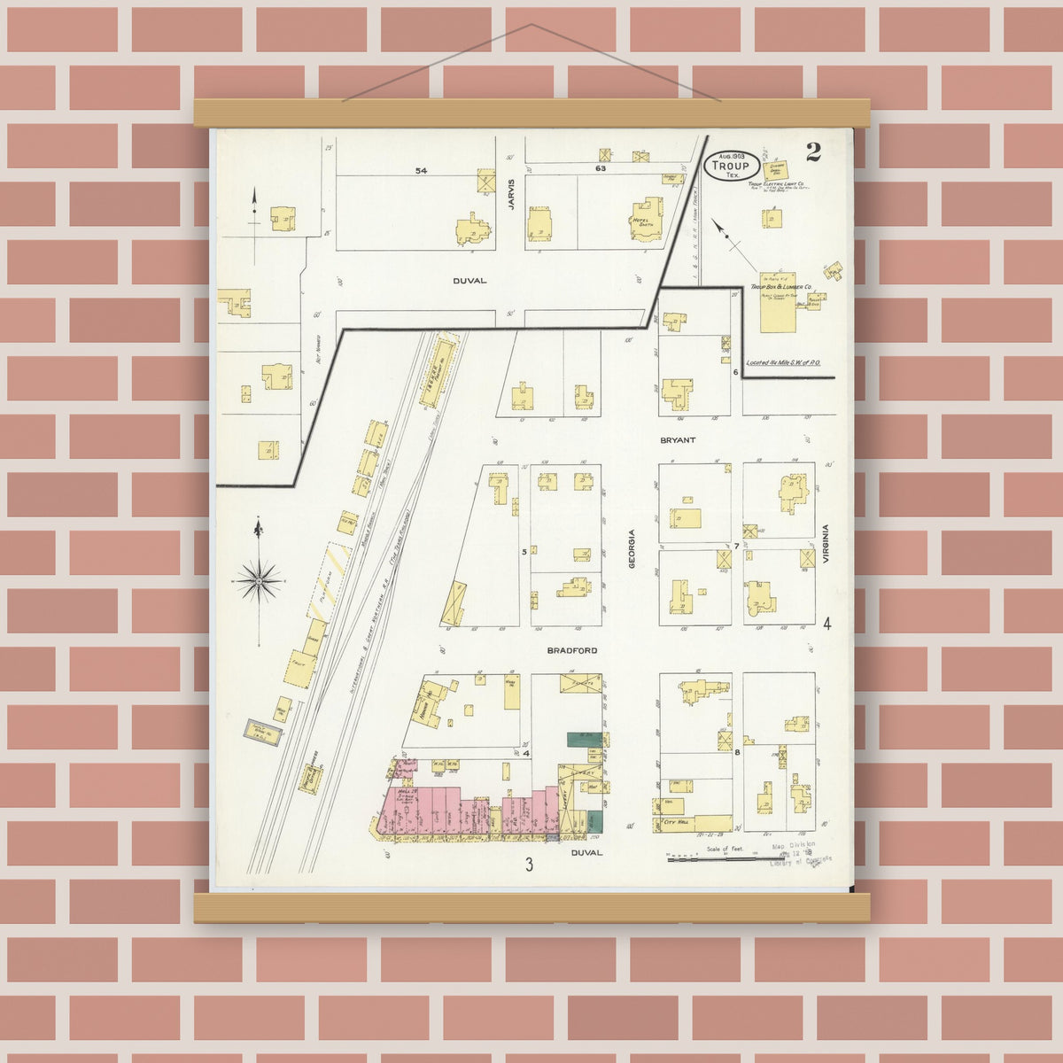 Old map wall art mockup — magnetic wood frame on brick wall — Sanborn Fire Insurance Map from Troup, Smith County, Texas (1909), Sheet #0002