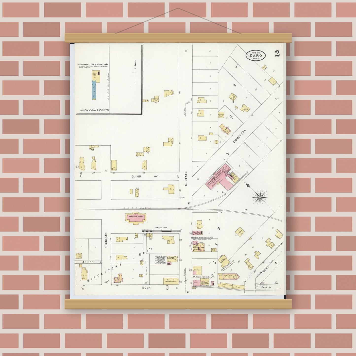 Old map wall art mockup — magnetic wood frame on brick wall — Sanborn Fire Insurance Map from Caro, Tuscola County, Michigan (1909), Sheet #0002