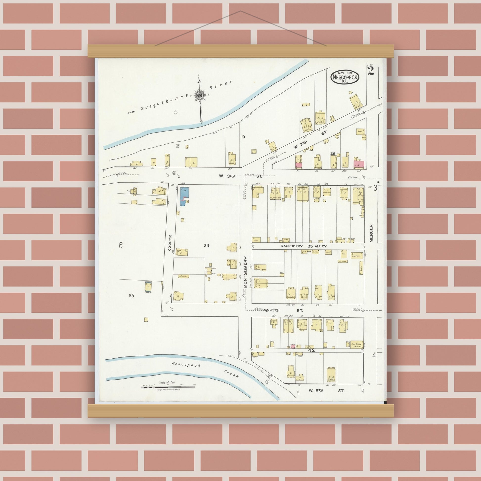 Old map wall art mockup — magnetic wood frame on brick wall — Sanborn Fire Insurance Map from Nescopeck, Luzerne County, Pennsylvania (1919), Sheet #0002