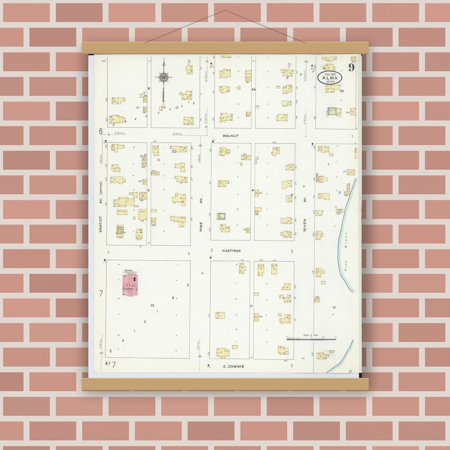 Old map wall art mockup — magnetic wood frame on brick wall — Sanborn Fire Insurance Map from Alma, Gratiot County, Michigan (1910), Sheet #0009