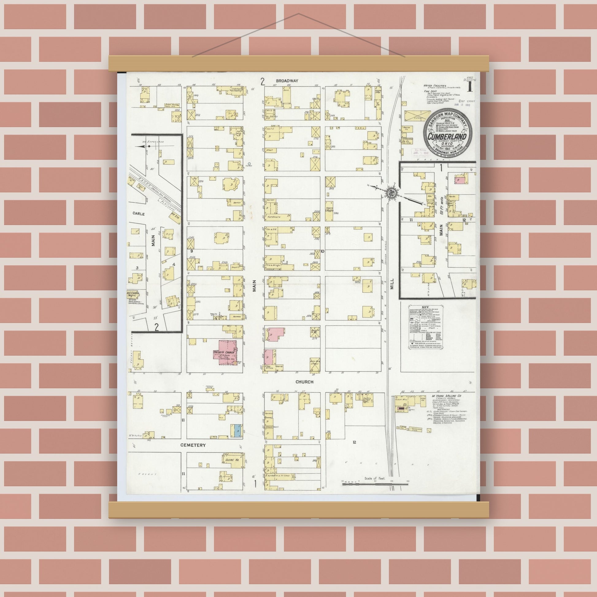 Old map wall art mockup — magnetic wood frame on brick wall — Sanborn Fire Insurance Map from Cumberland, Guernsey County, Ohio (1911), Sheet #0001