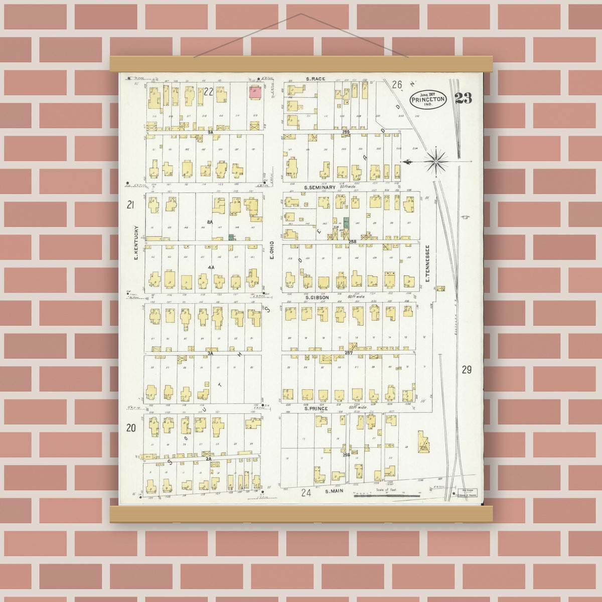 Old map wall art mockup — magnetic wood frame on brick wall — Sanborn Fire Insurance Map from Princeton, Gibson County, Indiana (1907), Sheet #0023