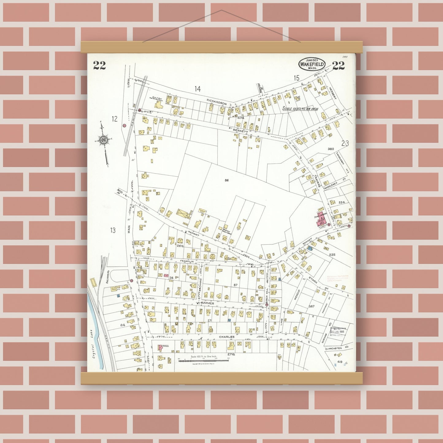 Old map wall art mockup — magnetic wood frame on brick wall — Sanborn Fire Insurance Map from Wakefield, Middlesex County, Massachusetts (1923), Sheet #0022