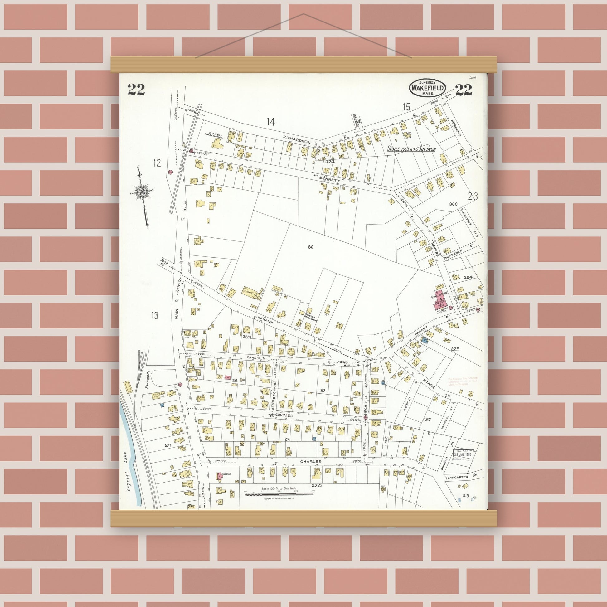 Old map wall art mockup — magnetic wood frame on brick wall — Sanborn Fire Insurance Map from Wakefield, Middlesex County, Massachusetts (1923), Sheet #0022