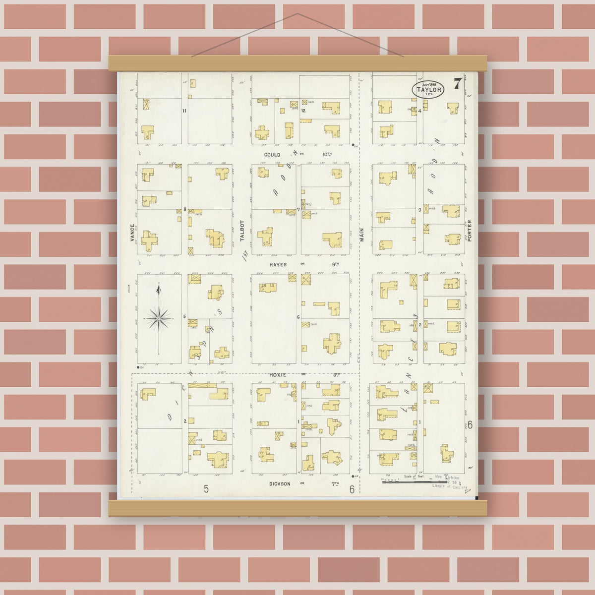 Old map wall art mockup — magnetic wood frame on brick wall — Sanborn Fire Insurance Map from Taylor, Williamson County, Texas (1898), Sheet #0007
