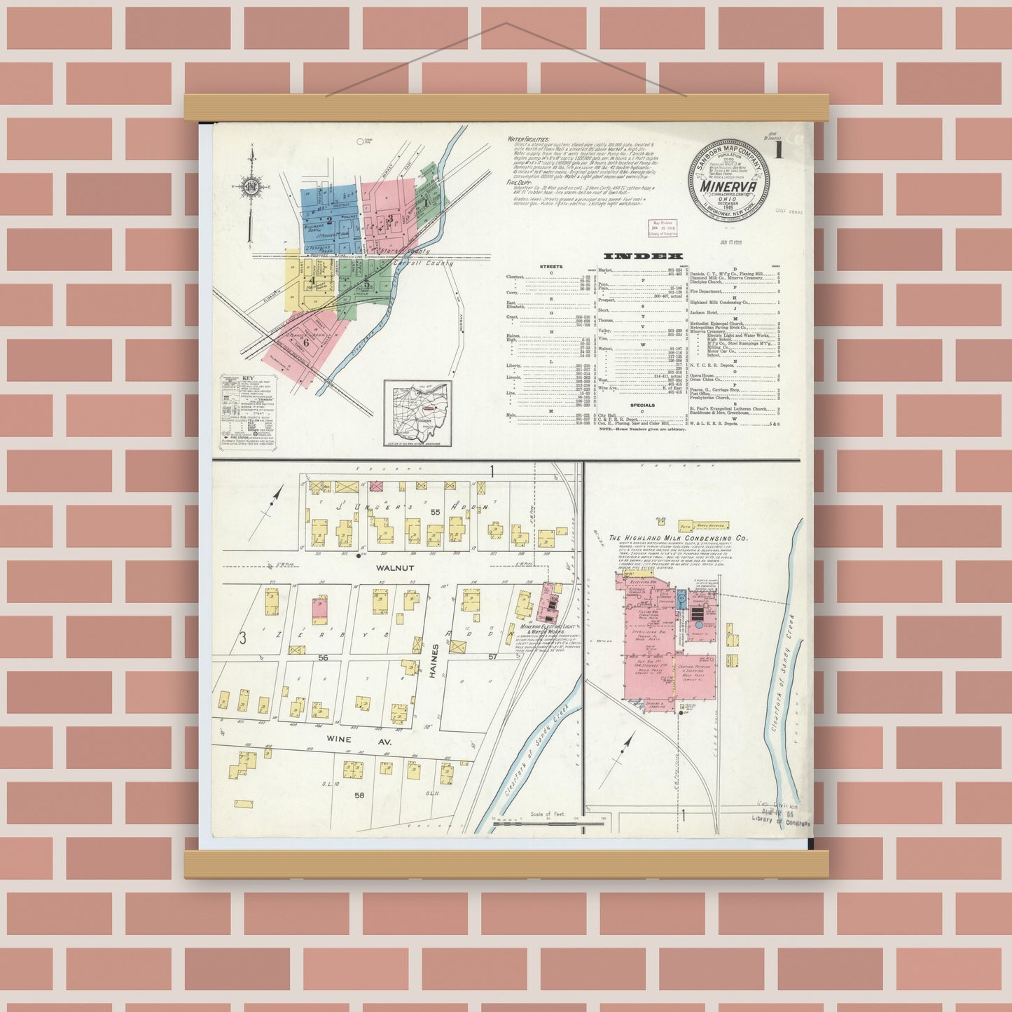 Old map wall art mockup — magnetic wood frame on brick wall — Sanborn Fire Insurance Map from Minerva, Stark And Carroll Counties, Ohio (1915) - Complete Map Set