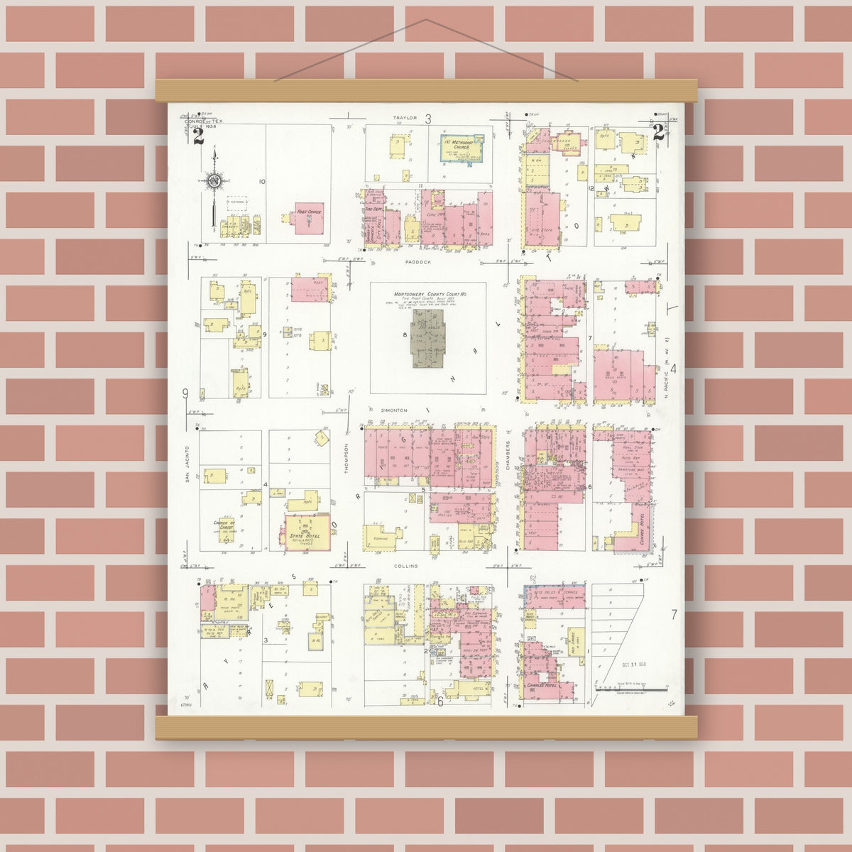 Old map wall art mockup — magnetic wood frame on brick wall — Sanborn Fire Insurance Map from Conroe, Montgomery County, Texas (1938), Sheet #0002