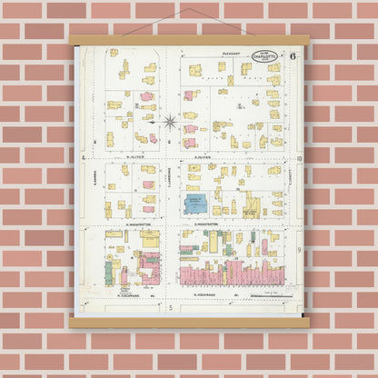 Old map wall art mockup — magnetic wood frame on brick wall — Sanborn Fire Insurance Map from Charlotte, Eaton County, Michigan (1904), Sheet #0006