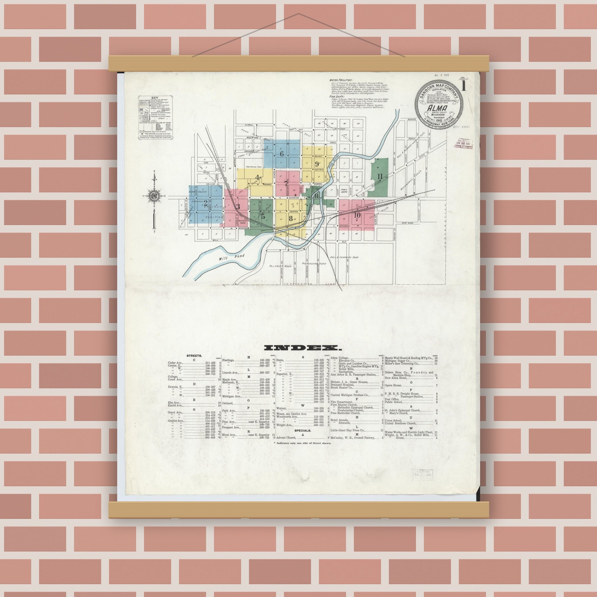 Old map wall art mockup — magnetic wood frame on brick wall — Sanborn Fire Insurance Map from Alma, Gratiot County, Michigan (1910), Sheet #0001