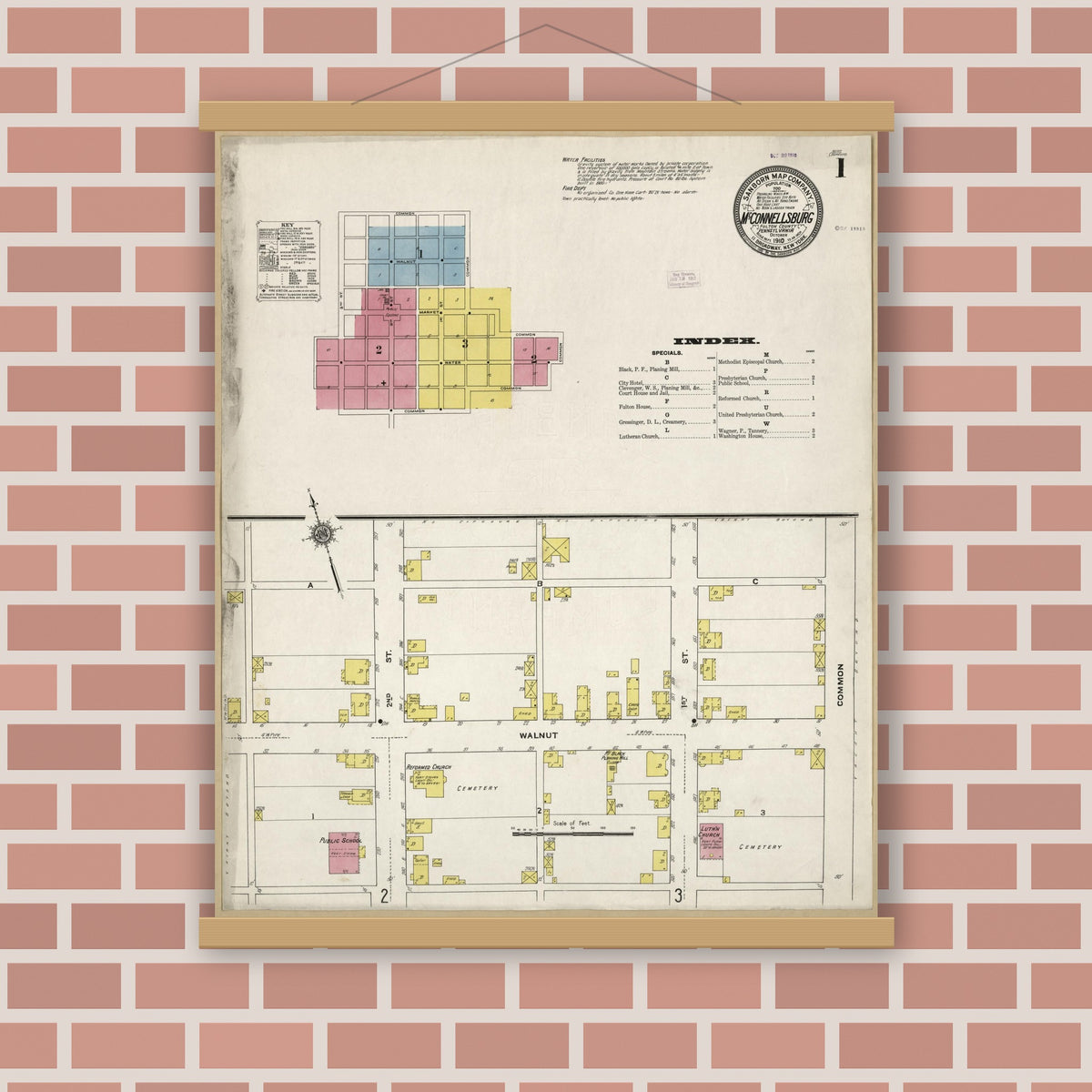 Old map wall art mockup — magnetic wood frame on brick wall — Sanborn Fire Insurance Map from McConnellsburgh, Fulton County, Pennsylvania (1910), Sheet #0001