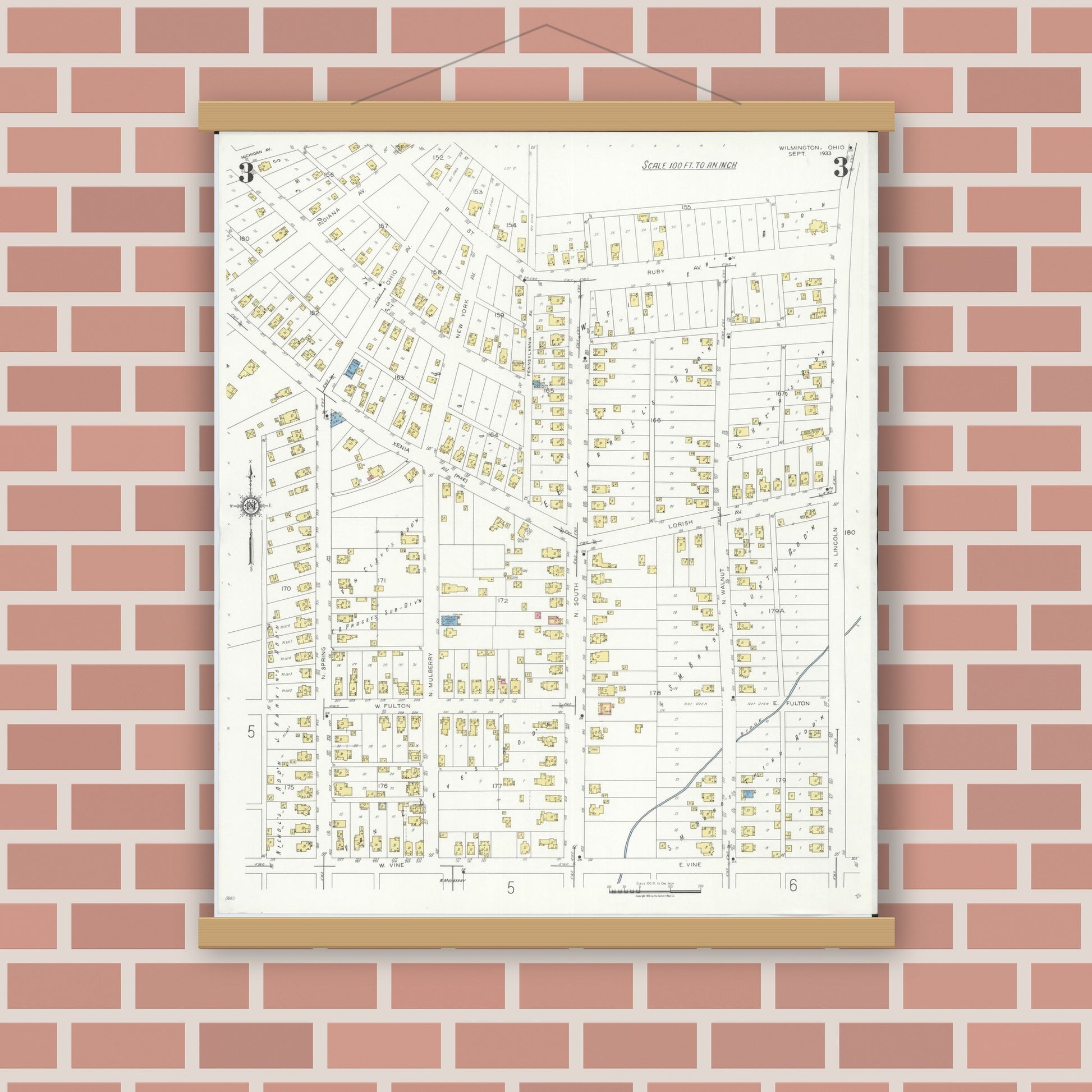 Old map wall art mockup — magnetic wood frame on brick wall — Sanborn Fire Insurance Map from Wilmington, Clinton County, Ohio (1933), Sheet #0003