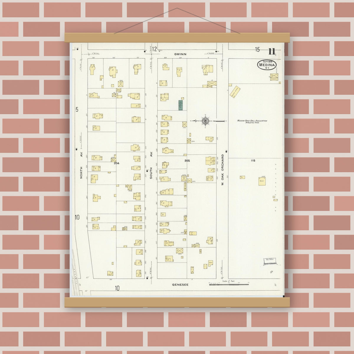 Old map wall art mockup — magnetic wood frame on brick wall — Sanborn Fire Insurance Map from Medina, Orleans County, New York (1909), Sheet #0011