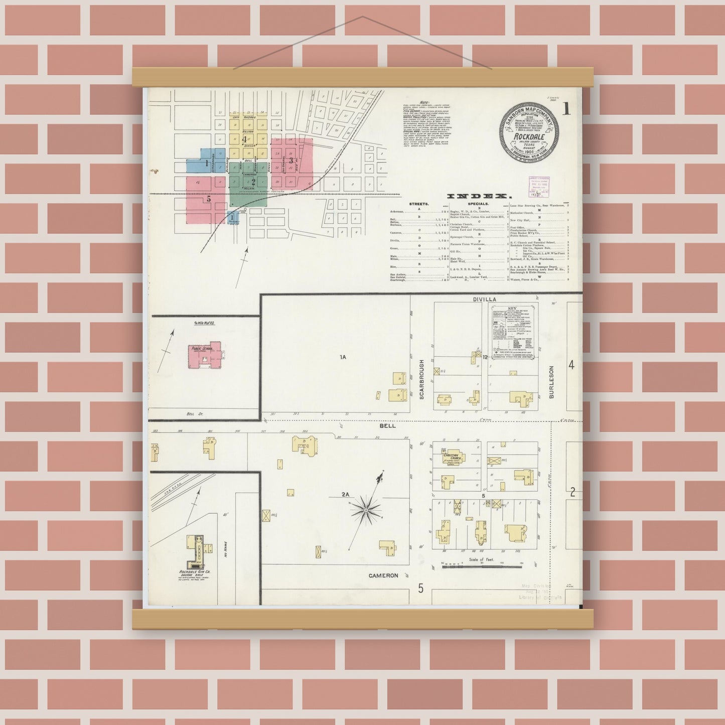 Old map wall art mockup — magnetic wood frame on brick wall — Sanborn Fire Insurance Map from Rockdale, Milam County, Texas (1906) - Complete Map Set