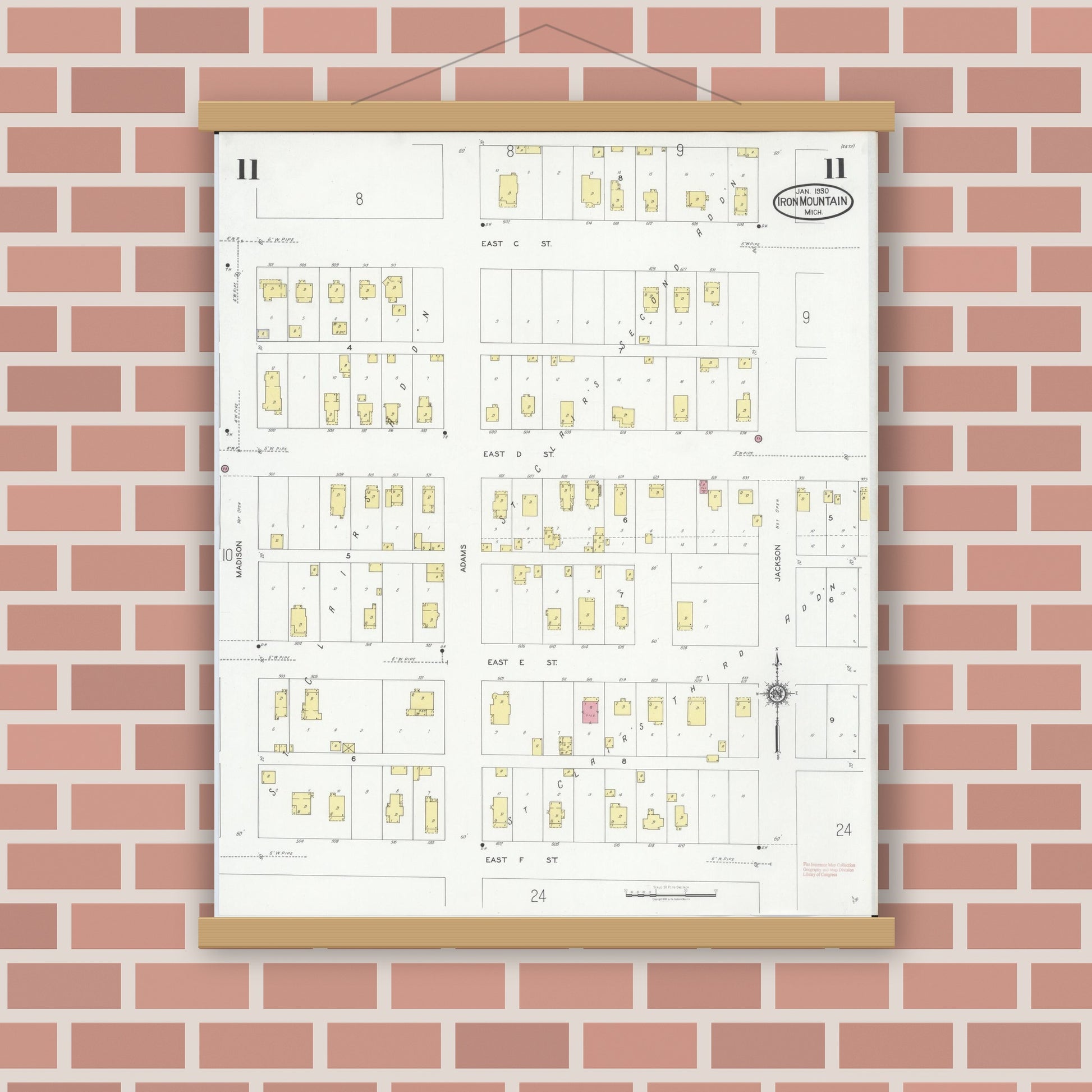 Old map wall art mockup — magnetic wood frame on brick wall — Sanborn Fire Insurance Map from Iron Mountain, Dickinson County, Michigan (1930), Sheet #0011