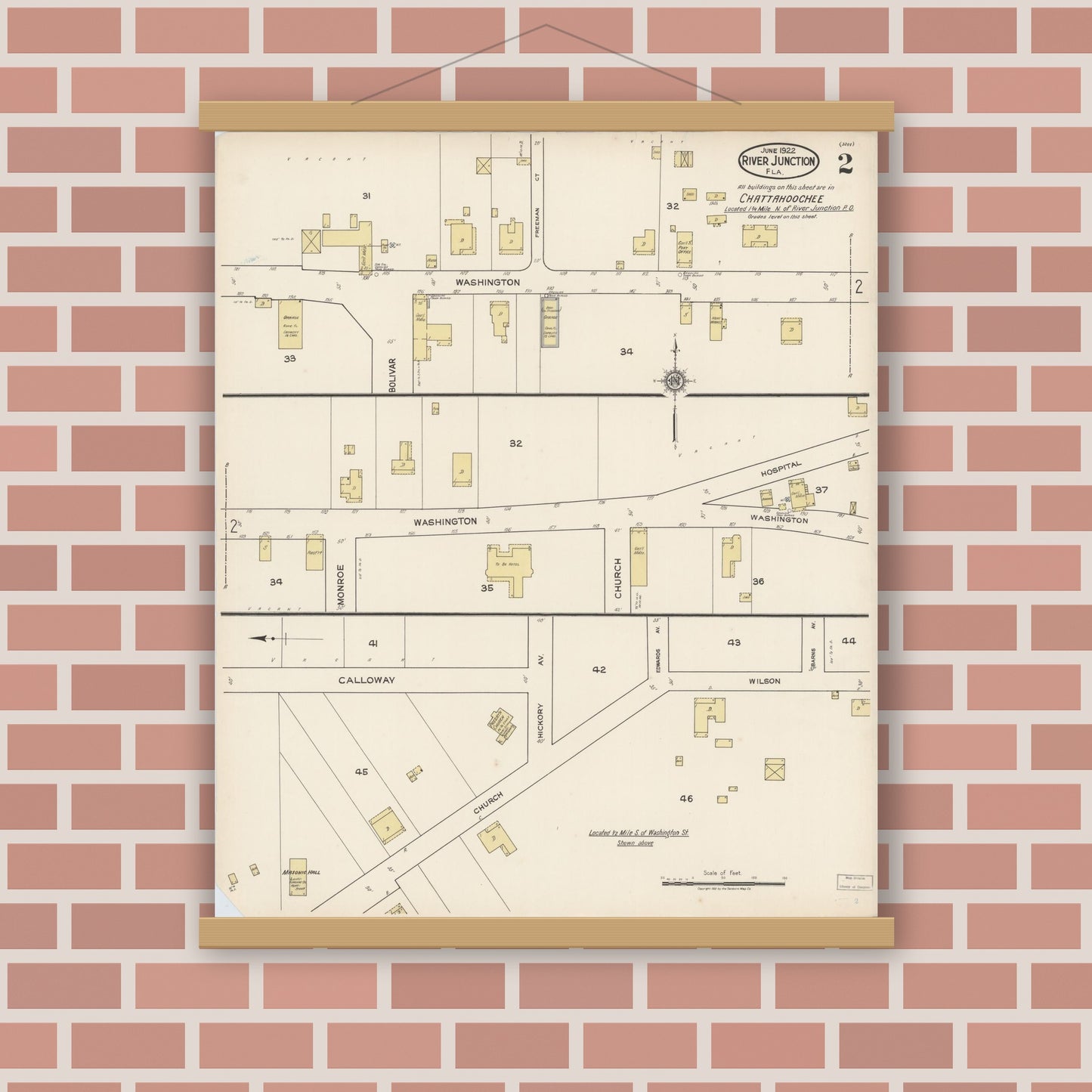 Old map wall art mockup — magnetic wood frame on brick wall — Sanborn Fire Insurance Map from River Junction, Gadsden County, Florida (1922), Sheet #0002