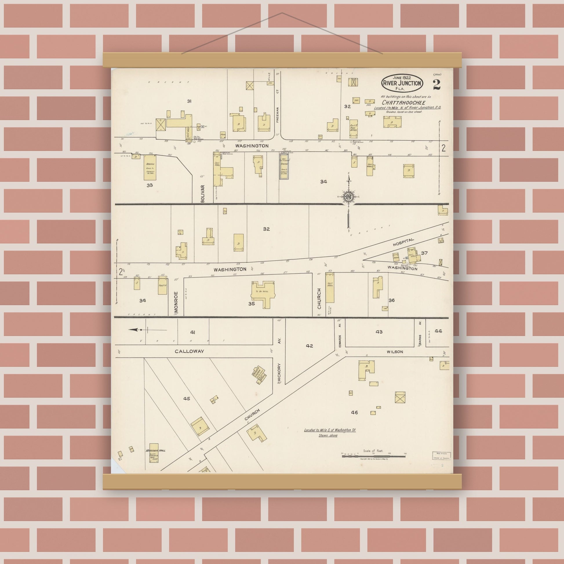 Old map wall art mockup — magnetic wood frame on brick wall — Sanborn Fire Insurance Map from River Junction, Gadsden County, Florida (1922), Sheet #0002